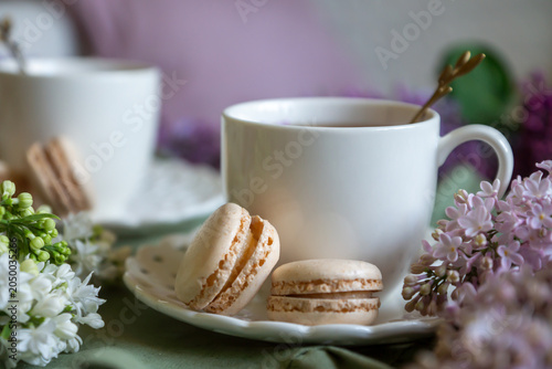 Canvastavla Spring flowers lilac, jasmine, bird cherry, rose hips, roses, peonies, poppies and lilies of the valley, tea and coffee in beautiful porcelain and ceramics