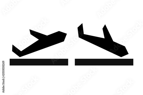 Arrivals and departure airplane icons on white background.