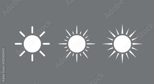Set of three simple sun icons with varying lengths of rays representing different levels of brightness or intensity.