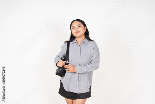 Foto Young woman gestures with hands, puckered lips