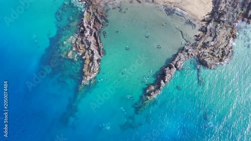 Aerial Drone View of Scuba Divers Training in Crystal Clear Coastal Waters of Puerto del Carmen Lanzarote