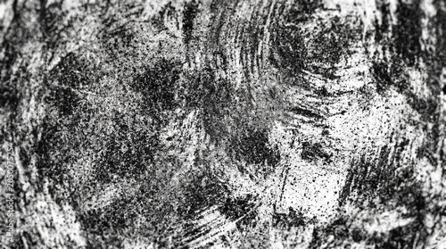 Black and white abstract textured background with scratches and marks