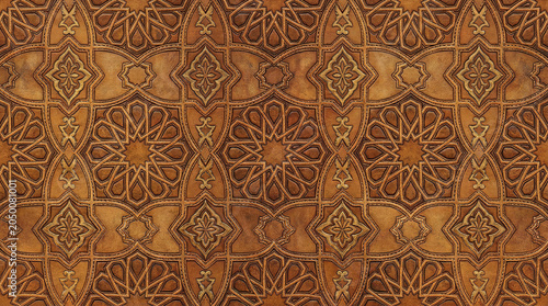 Geometric Moroccan leather texture with star patterns and interlocking shapes.