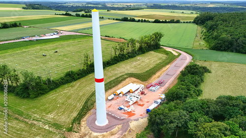 Aerial View of Wind Turbine Construction Site in Green Countryside