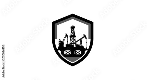 Obraz na plátně Oil drilling rig silhouette inside a protective shield emblem.