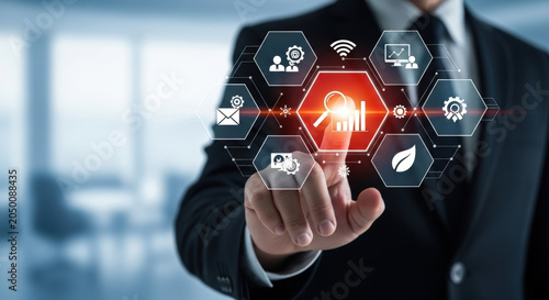 Businessman Touching Analytics Icon On Screen Displaying Data Analysis Charts and Graphs for Business Intelligence and Performance Management