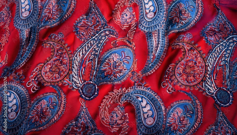 Fototapeta premium a red and blue paisley patterned fabric