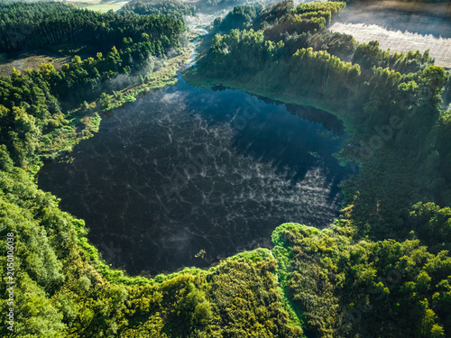 Aerial view of foggy lake a...