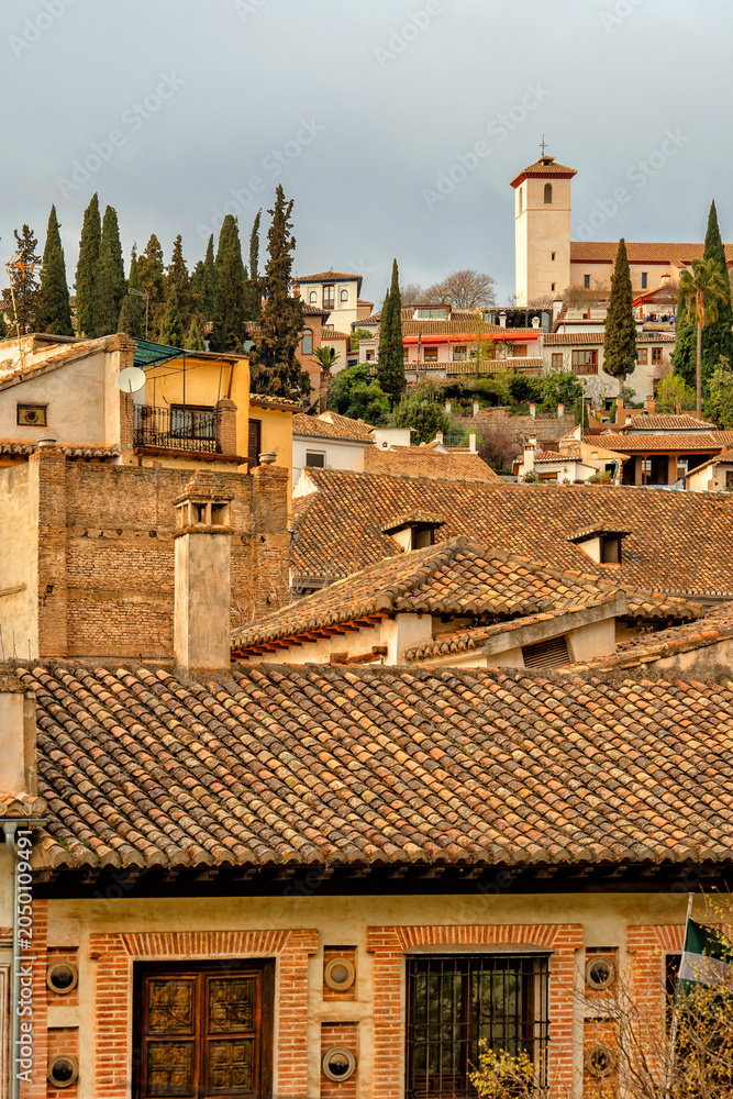 Fototapeta premium Spain. Granada. Historical streets of Spanish Granada. The Alhambra Palace complex. Beautiful Spanish city. Travel, Tourism 