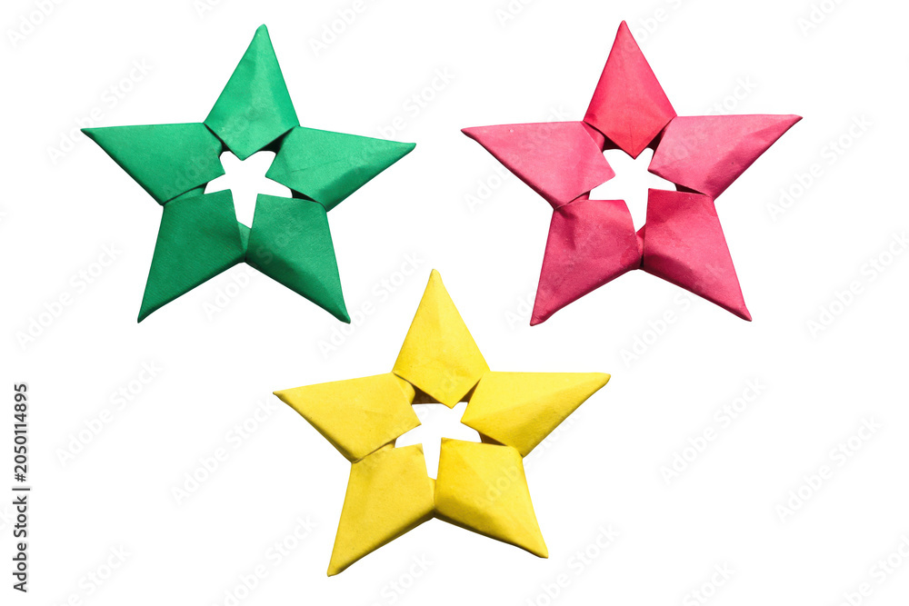 Obraz premium Green red and yellow origami stars together on transparent background festive craft objects for decoration.