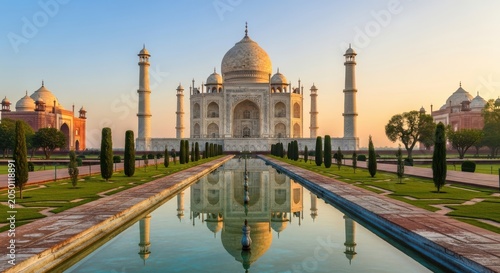 Reflection of taj mahal in serene water body at sunset