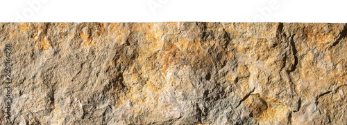 Natural yellow stone wall texture rough mineral surface background for building decoration panoramic copy space design