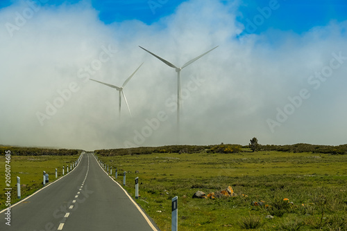 Wind Turbines Emerging From Clouds on Paul da Serra Plateau Madeira