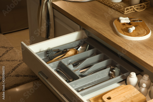 Open kitchen drawer with di...