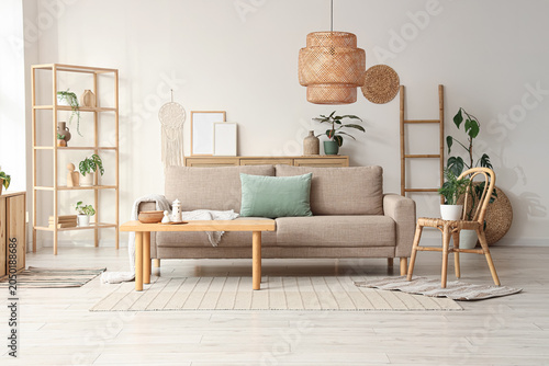 Comfortable sofa, wooden ta...