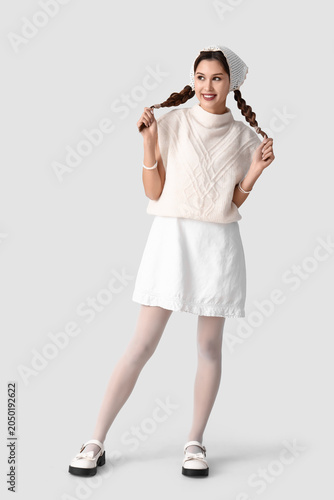 Stylish young woman in head...