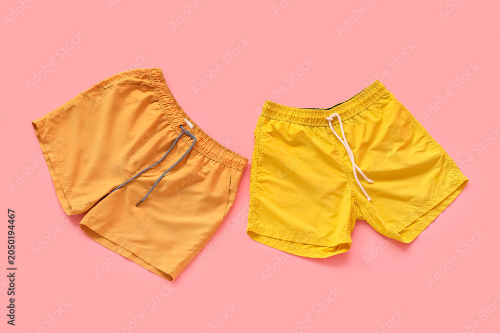 Obraz premium Swimming trunks on pink background