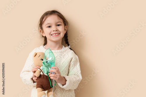 Cute little girl with nebul...