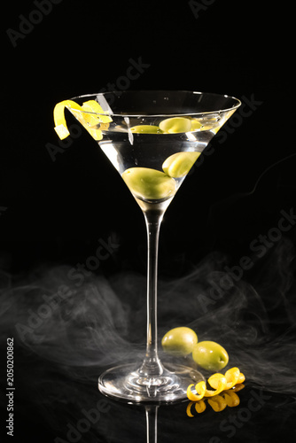 Glass of tasty martini with...