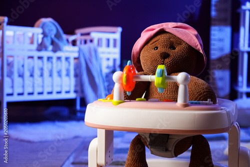 Baby walker with plush bear...