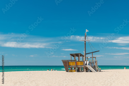 Schilderij op canvas Wooden pirate ship playground on a sandy Mediterranean beach in Spain