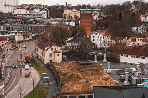 View of Mölndals Kvarnby in Sweden showing buildings and roads with some vehicles and trees