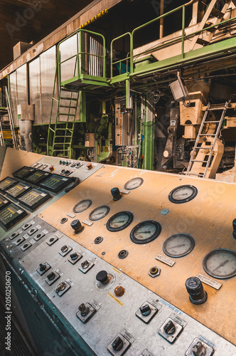Old control panel in abandoned industry located in Mölndal Sweden showing signs of decay and neglect over time