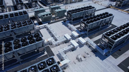 Aerial view of data center with ventilators, advanced technology cooling systems, HVAC at data center rooftop, cooling infrastructure for server operations