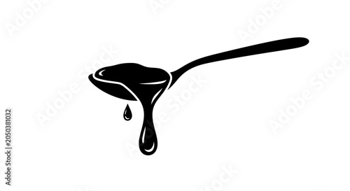 Spoon holding a thick liquid drop symbolizes culinary precision and high-quality food preparation standards.
