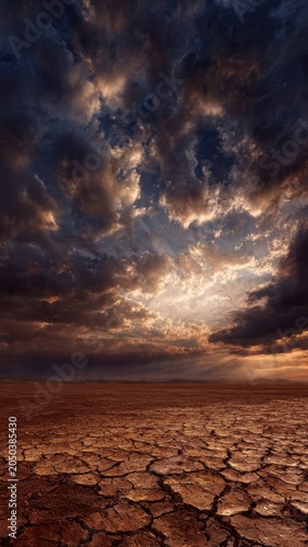 Dramatic Sky Over Cracked Desert Ground