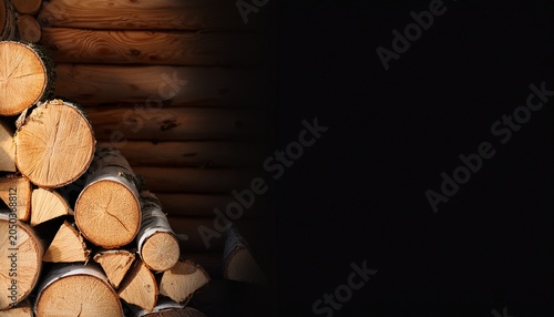 Background Of Birch Firewood Stacked In A Woodpile