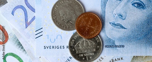 Vászonkép Swedish krona money bills and coins on table