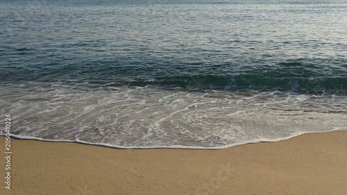 Tableau sur toile Close-Up of Waves and Sandy Shore