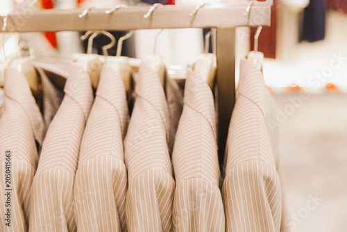 Canvastavla Beautiful striped jackets hang on a hanger in the store.