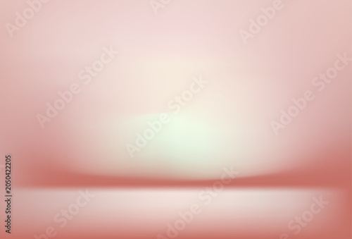 Фотография A brightly lit studio background with a soft pink and white gradient, warm light