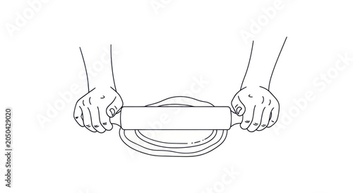 Fotografie Hands using wooden rolling pin to flatten pastry dough.