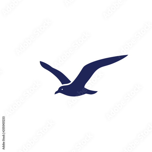 Tableau sur toile Minimalist navy blue seagull silhouette flying against white background