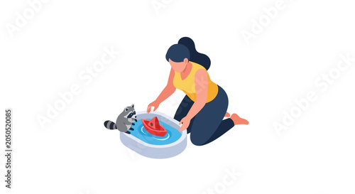 Young woman hand washing small cat in sink.