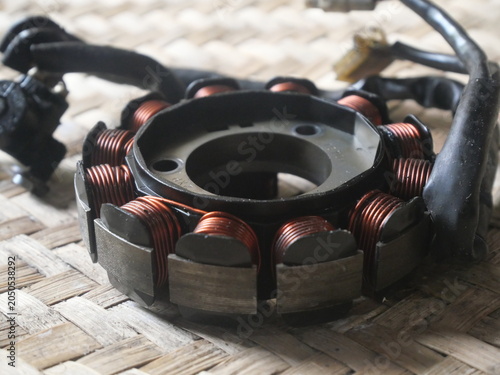 Motorcycle stator coil delivering reliable electrical power, efficient charging, ignition performance, durability, and dependable operation daily.