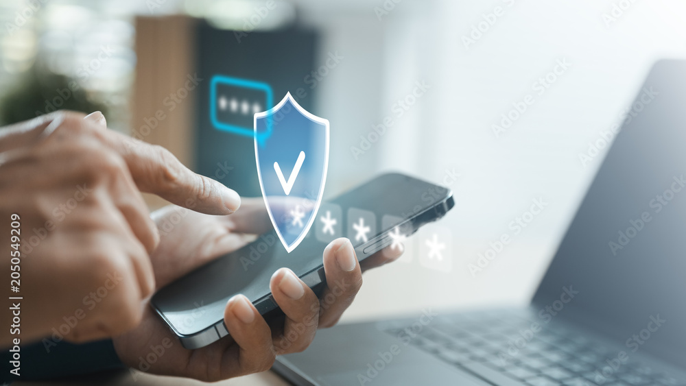 Fototapeta premium User verifying secure login on a smartphone with OTP authentication and digital security shield, representing cybersecurity, identity protection, account verification, and secure online access.