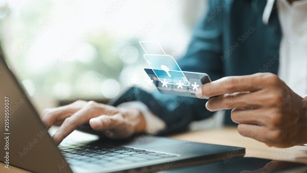 Naklejka premium Secure online payment using a credit card with digital authentication and fraud protection. Represents safe checkout, financial security, identity verification, and trusted e-commerce transactions.