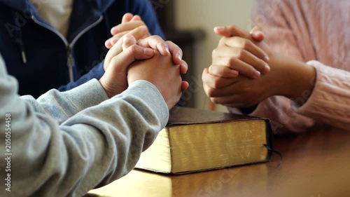 Group of people praying. Christian worship and pray. Christian group of people holding hands praying worships together to believe