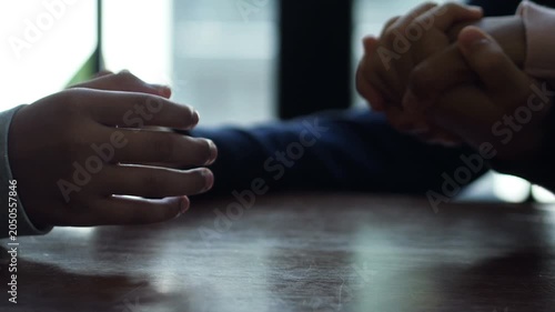 Group of people praying. Christian worship and pray. Christian group of people holding hands praying worships together to believe