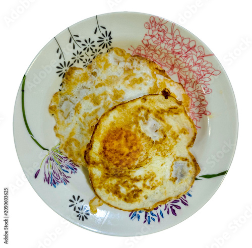 Foto Two Fried Eggs on Floral Plate