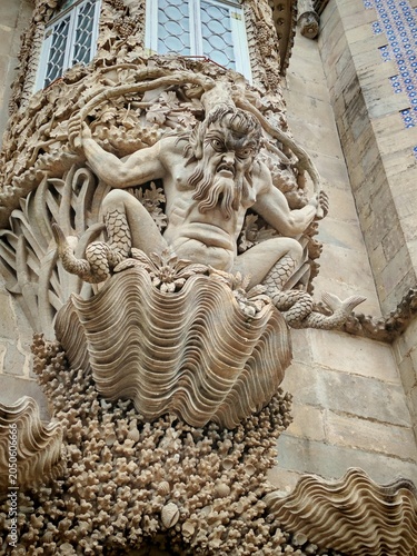 Sintra,Portugal-April 15,2026:Demon supports the balcony at the entrance to Pena castle, Sintra, Portugal.