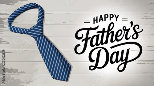 A blue striped necktie on a wooden background with Happy Father's Day text