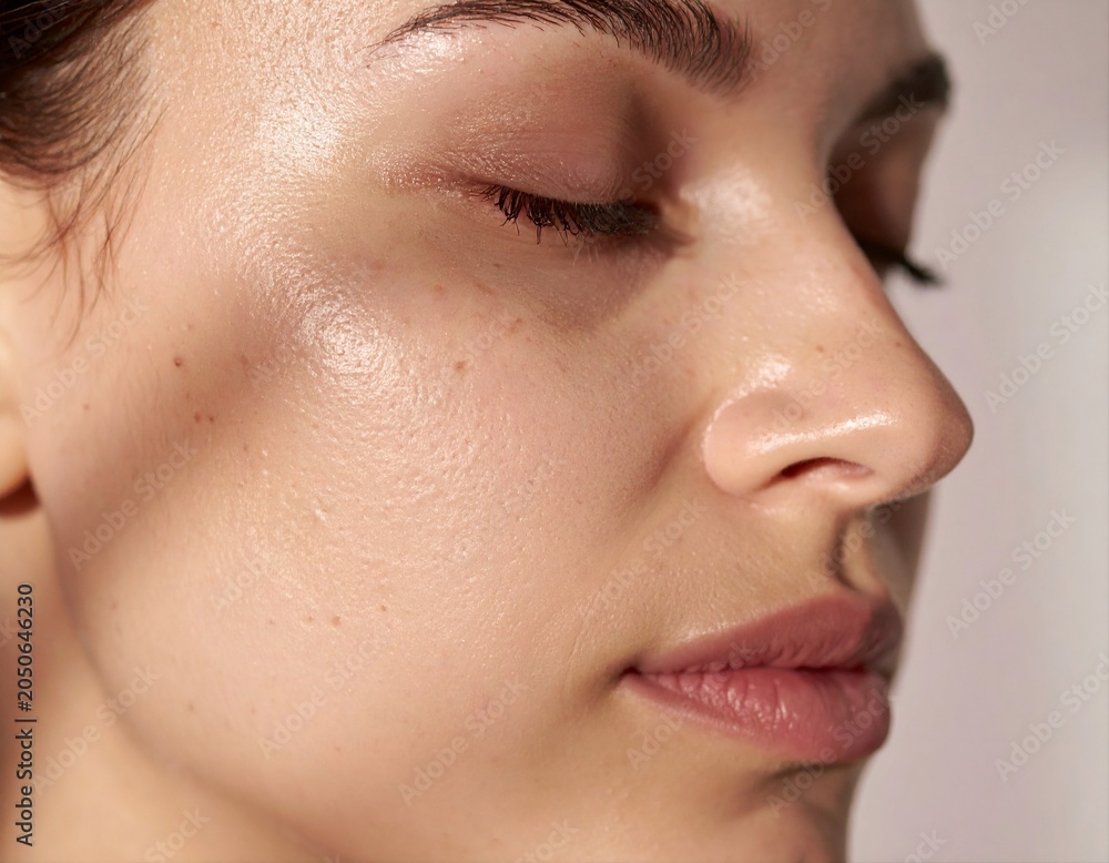 Fototapeta premium Woman face profile dewy glowing skin close up natural beauty portrait
