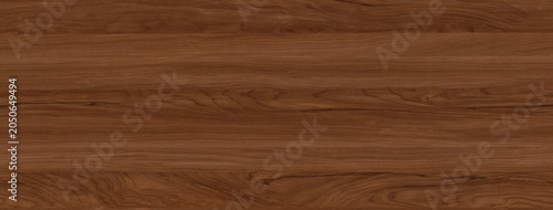 Dark reddish brown wood texture background. Natural walnut mahogany wooden board with elegant grain curves.