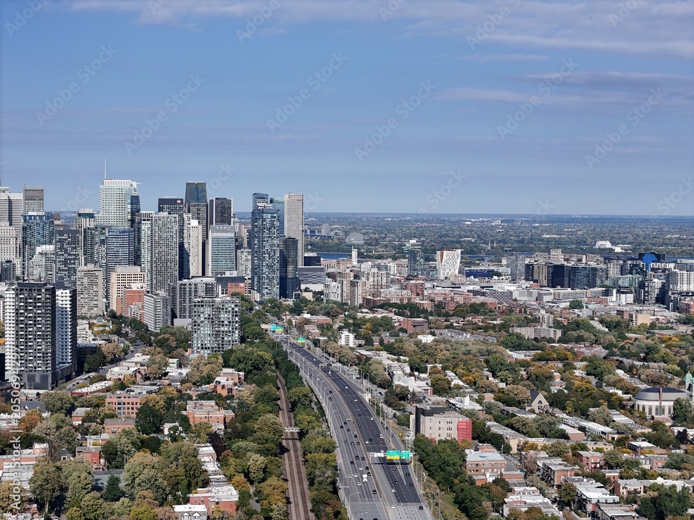 Fototapeta premium Aerial view of Montreal downtown skyline with Autoroute 720 and modern skyscrapers, Quebec, Canada. g.