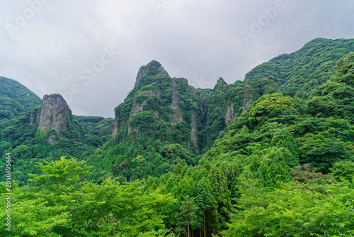 Green rocky mountain landscape in rural Japan